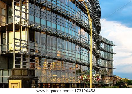 Pittsburgh Pennsylvania USA - July 31 2016: Corporate headquarters for ALCOA the Aluminum Company of America with a reflection of the Pittsburgh skyline in the windows.