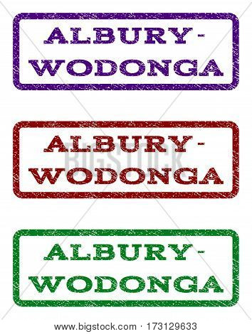 Albury-Wodonga watermark stamp. Text caption inside rounded rectangle with grunge design style. Vector variants are indigo blue red green ink colors. Rubber seal stamp with scratched texture.