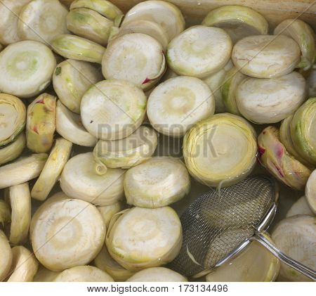 Clean Bottoms Of Artichokes Prepared By The Cook In The Water