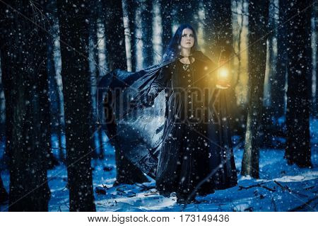 Sorceress and the lamp in the magic forest