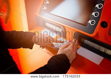 Woman Entering Pin Code