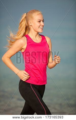 Jogging In Th Beach - Woman Runns Near Sea On Early Summer Morning