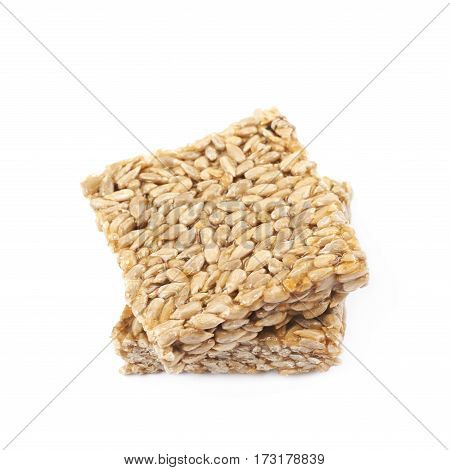 Two pieces of gozinaki confection sweets isolated over the white background