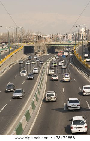 Tehran IRAN - February 22 2017 Emam ALi Highway at Noon Time Cars moving Fast through Autobahn