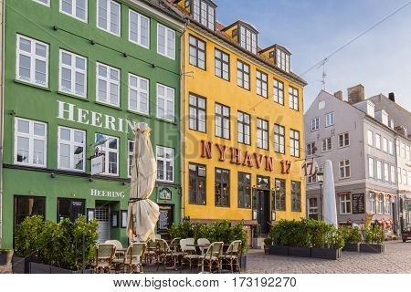 Famous restaurants on the sidewalk in the first morning light Nyhamn Copenhagen - February 23 2017