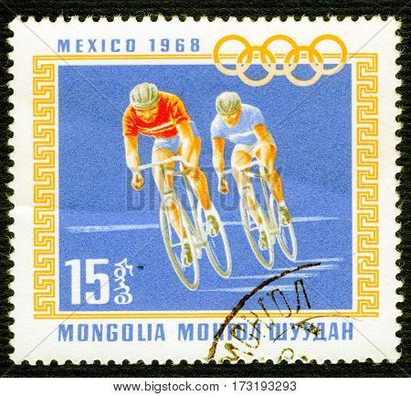 MONGOLIA - CIRCA 1968: Postage stamp printed in Mongolia  with a picture of a cyclists, from the series 