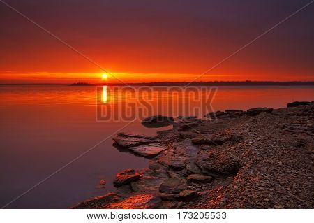 View of the rocky shoreline of Truman Lake taken outside of Clinton Missouri at the Cooper Conservation area.