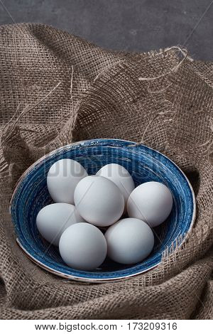 Ecological natural fresh eggs collected in the plate for cooking