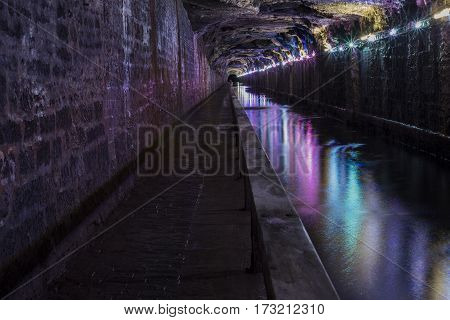 Newly lit Falkirk tunnel with the Caledonian Canal passing through.