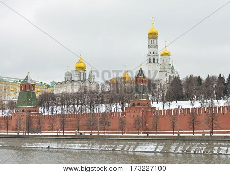 MOSCOW - February 24, 2017 View from the Sofia quay at Archangel and Annunciation Cathedral. Moscow Kremlin . Beautiful scenery on the background of the cloudy sky.