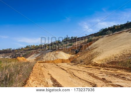 Sand quarry near the town of Orikhiv in Zaporizhzhia region of Ukraine. Excavator electric power shovel  with bucket capacity of five cubic meters. September 2006