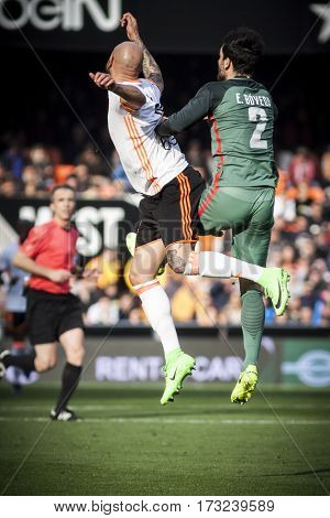 VALENCIA, SPAIN - FEBRUARY 19: (L) Zaza and Boveda during La Liga soccer match between Valencia CF and CD Athletic Club Bilbao at Mestalla Stadium on February 19, 2017 in Valencia, Spain