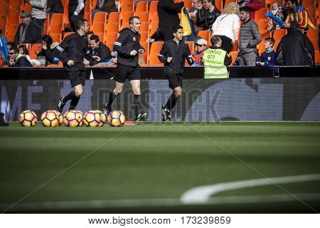 VALENCIA, SPAIN - FEBRUARY 19: Referee team during La Liga soccer match between Valencia CF and CD Athletic Club Bilbao at Mestalla Stadium on February 19, 2017 in Valencia, Spain