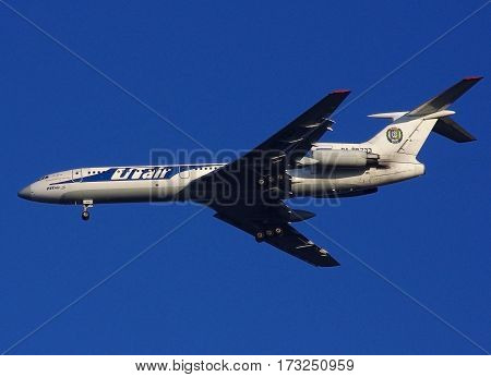 VNUKOVO MOSCOW REGION RUSSIA - October 10 2010: Tupolev Tu-154M Utair airline landing in Vnukovo International Airport.