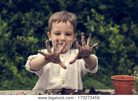 Little Kid Playful Cheeky Dirt