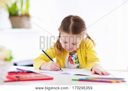 Kids Read, Write And Paint. Child Doing Homework.