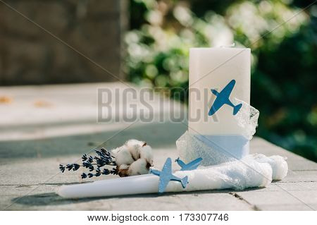 Tender Lavender And Cotton Put In A Boutonniere, With Candles Decorated With Cloth And Small Airplan