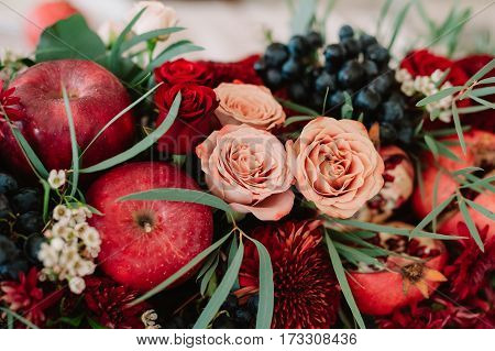 Autumnal Wedding Bouquet Of Roses, Apples, Grape And Pomergranate, In Red Colour, Closeup