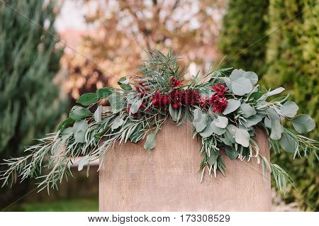 Small Bouquet With Aster And Green Petals On Easel With Inviting Banner