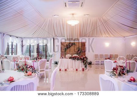 Beautifully Decorated Wedding Hall In White And Red Colours, Decorated With Tenderless Cloth