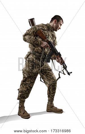 sodier in military uniform with machine gun isolated on white background