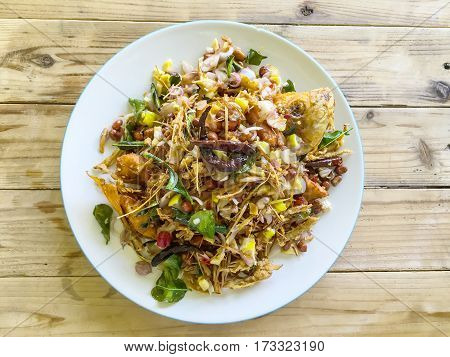 Fried fish with herb sauce spicy delicious food of Thailand.