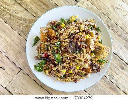 Fried fish with herb sauce spicy delicious food of Thailand.