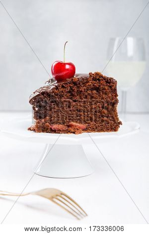 Chocolate cake with juicy cherries