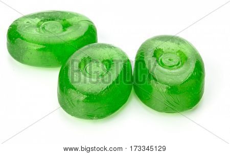 Three colorful fruit hard sugar candies,  boiled sweeties or sugar plums isolated on white background cutout