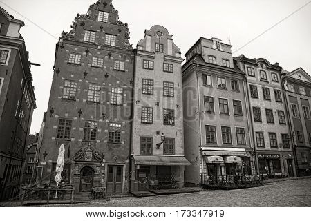 STOCKHOLM SWEDEN - AUGUST 20 2016: Cafes and restaurants at the Stortorget square(Gamla Stan).Stortorget is one of the most important squares in the Old Town in Stockholm Sweden on August 20 2016.