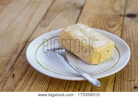 Halva Cake With Chocolate And Fork On The Plate