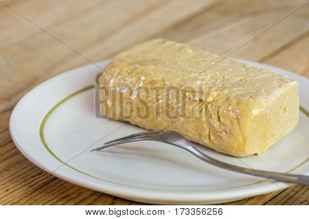 Halva Cake With Chocolate And Fork On The Plate