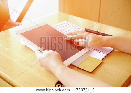 Woman's Hands Holding Credit Card And Using Laptop. Online Shopping