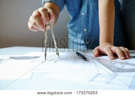 Close Up Man Working Of Architect Sketching A Construction Project On His Plane Project At Site Cons