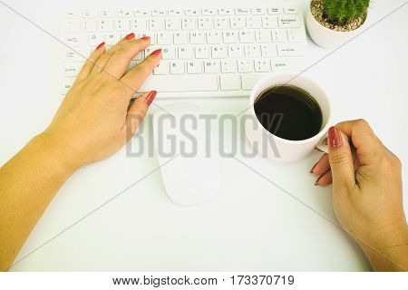 Business Women Working At Your Desk Coffee Cup In Hand