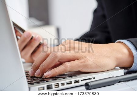 Business Man Hand Pointing At Business Document During Discussion At Meeting