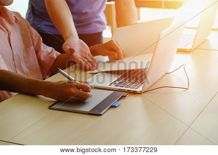 The Above View Of Young Man Dicussing Data At Meeting