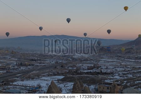Cappadocia, Turkey - January, 20th, 2017 - hotfire balloons festival winter morning cappadocia turkey