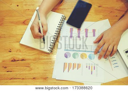 Asian business meeting dicuss analysis report view from top. concept of business analysis data analysis.
