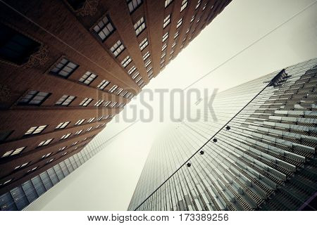NEW YORK CITY - NOV 12: Downtown skyscrapers in a foggy day on November 12, 2014 in Manhattan, New York City. With population of 8.4M, it is the most populous city in the United States.