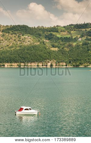 Boat on the Zlatar lake on the sunny