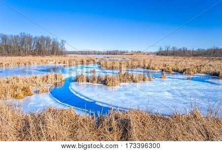 Winter view of Wolf Lake in near Grantsburg Wisconsin USA.