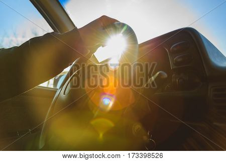 afternoon sun glare filled the car interior
