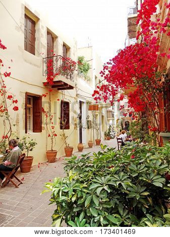door architecture detail in house building with bougainvillea Greece