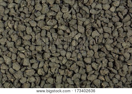 Aromatic green tea leaves with ginseng. Texture.