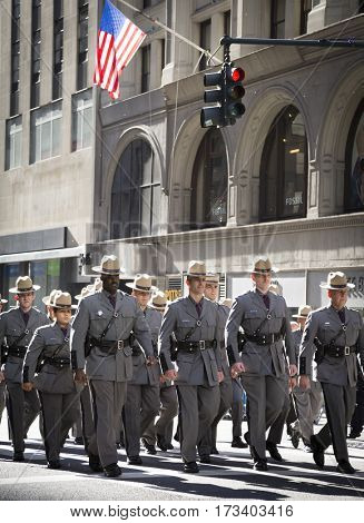 NEW YORK - NOV 11, 2016: NY State Troopers marchin the annual Americas Parade produced by the United War Veterans Council UWVC on 5th Avenue on Veterans Day in Manhattan.
