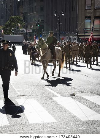 NEW YORK - 11 NOV 2016: People in World War I uniforms march in the annual Americas Parade produced by the United War Veterans Council UWVC on 5th Avenue on Veterans Day in Manhattan.