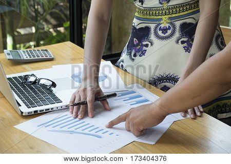 The above view of business meeting dicuss financial data