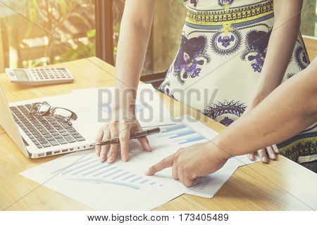 The above view of business meeting dicuss financial data