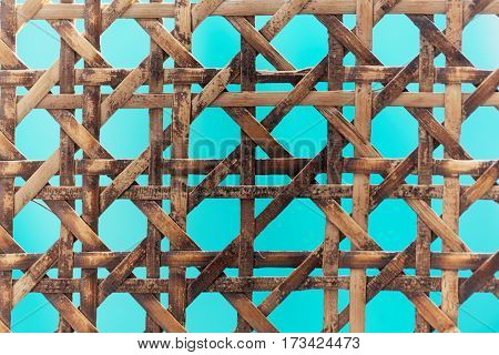 A macro photo of old wooden basketwork.
